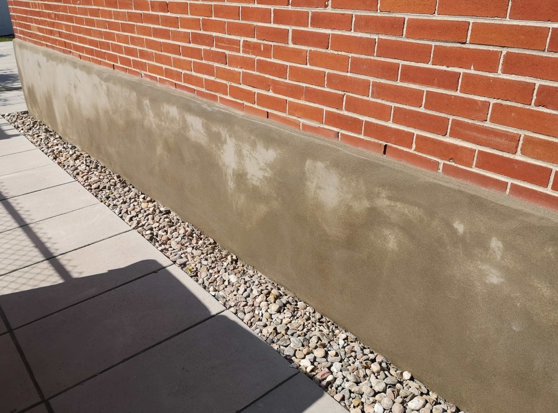 Finished foundation parging on a Toronto home